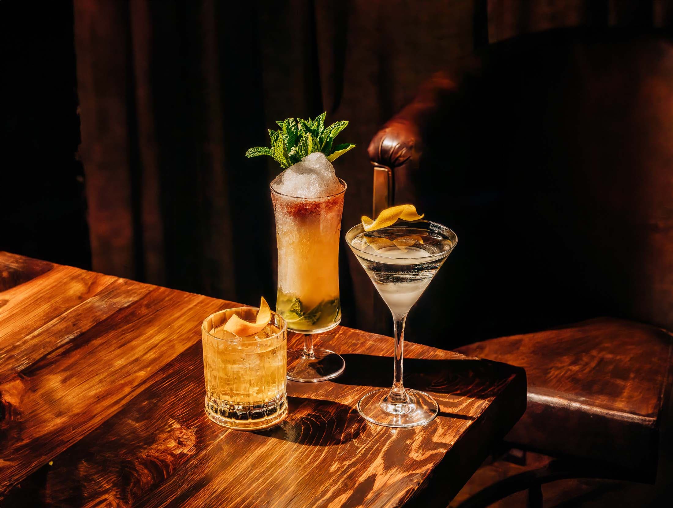 Three Cocktails on a wooden table